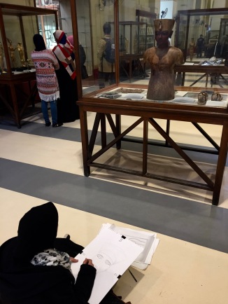 Egyptian Art Student in Egyptian Museum